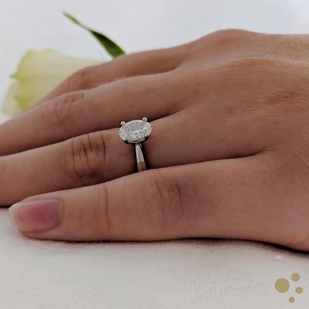 Classic Oval Solitaire 0.70ct Diamond Platinum Ring - Deacon & Son