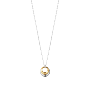Georg Jensen Curve necklace pairs 18ct yellow gold with sterling silver. Two rounded forms nestle together to create a sculptural biomorphic pendant.