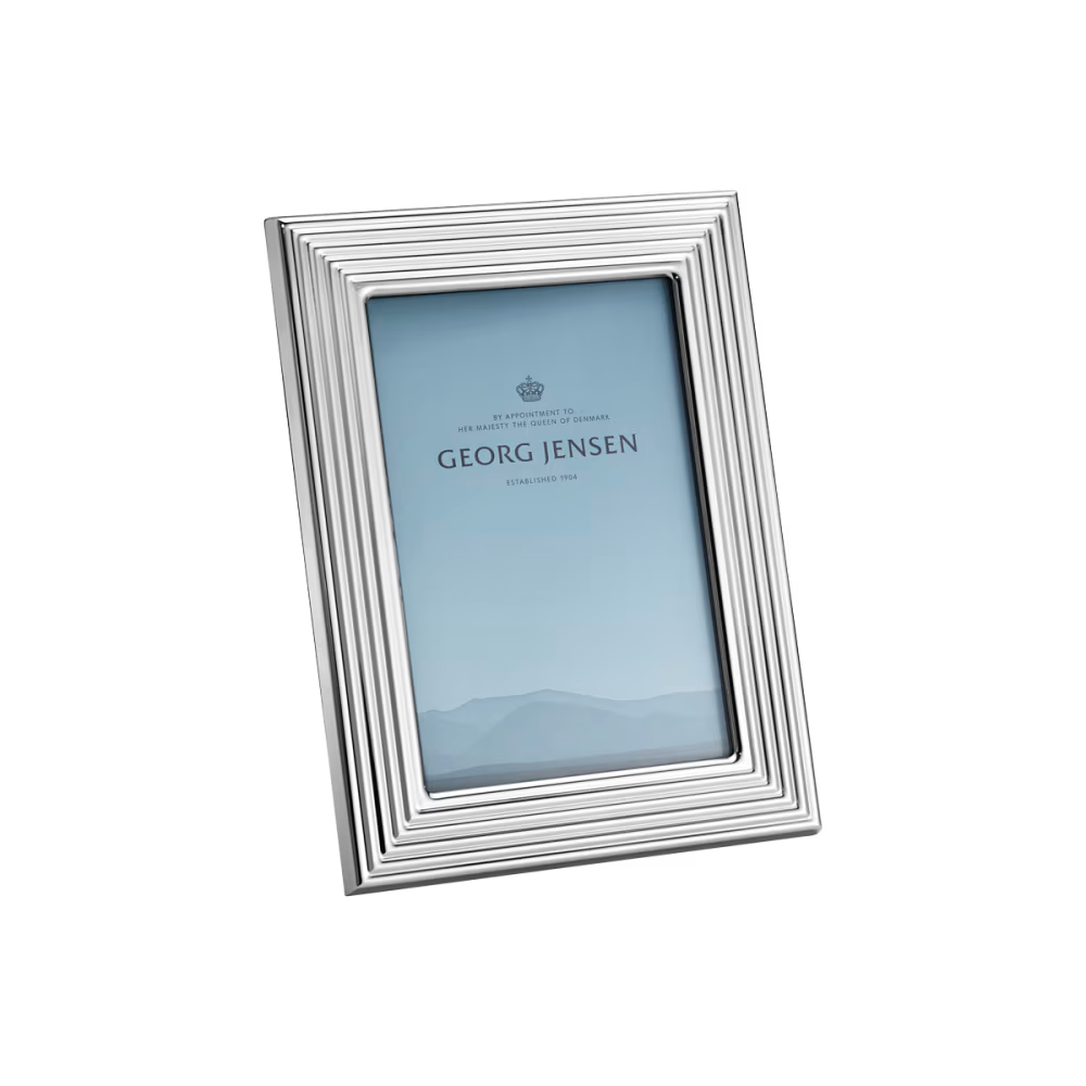 Close-up of the Georg Jensen Bernadotte picture frame showcasing polished stainless steel and elegant Scandinavian design.