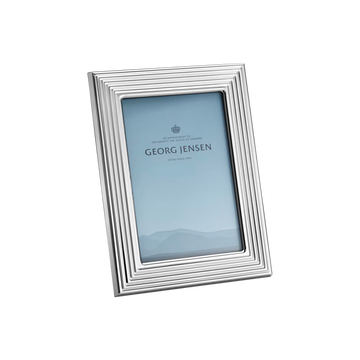Close-up of the Georg Jensen Bernadotte picture frame showcasing polished stainless steel and elegant Scandinavian design.