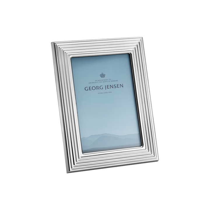 Close-up of the Georg Jensen Bernadotte picture frame showcasing polished stainless steel and elegant Scandinavian design.