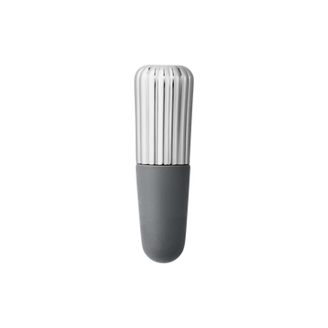 Close-up of the Georg Jensen Bernadotte Wine Stopper showcasing polished stainless steel and iconic grooved detailing.