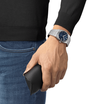 Tissot PRX 40mm luxury sports watch with automatic movement and blue dial