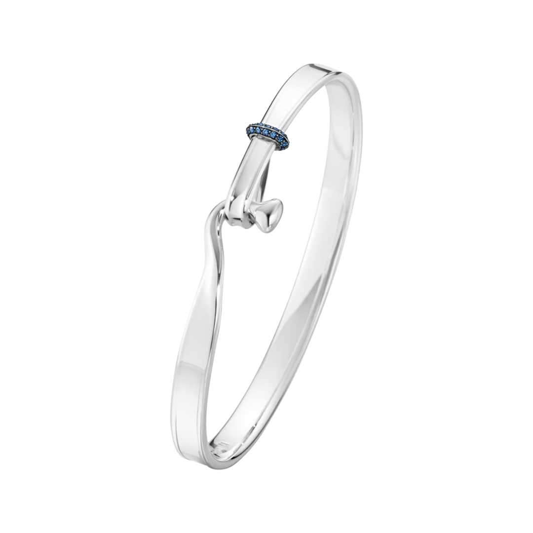 Georg Jensen Torun sterling silver bangle with blue sapphire detail
