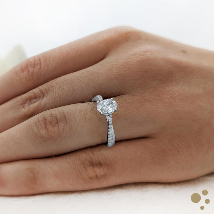 Skye Twist Oval Solitaire 0.80ct Diamond Platinum Ring