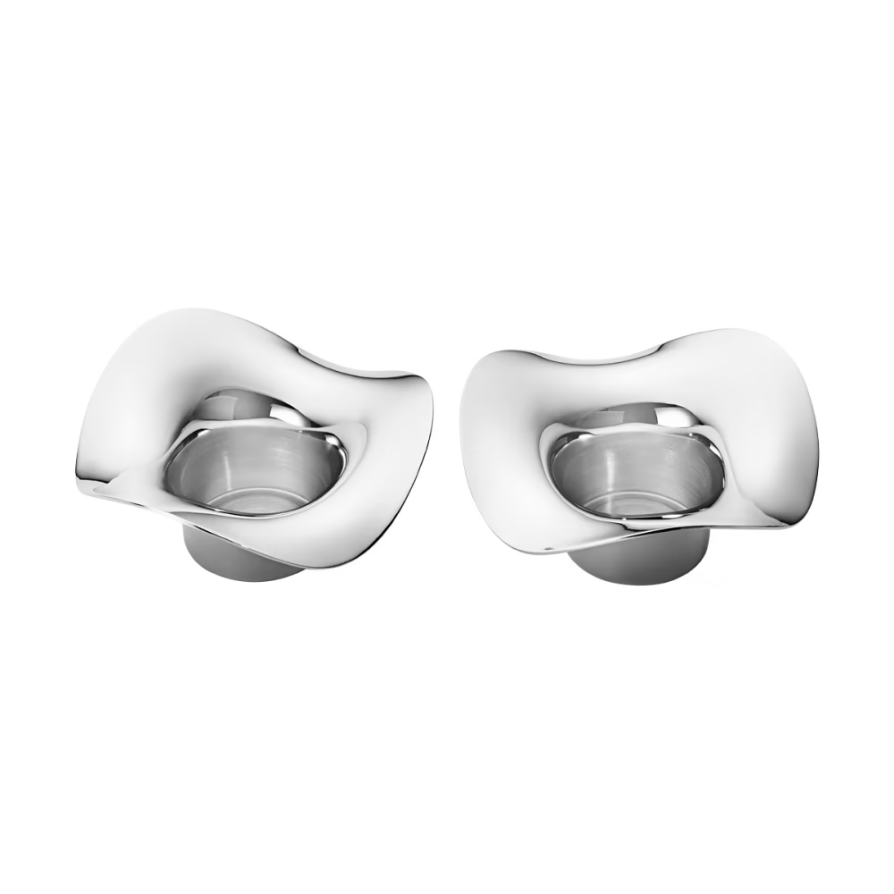 Georg Jensen Cobra stainless steel tealight holders designed by Constantin Wortmann.