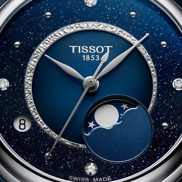 Tissot Desir moon phase close up of blue aventurine dial, and diamond set hour markers.