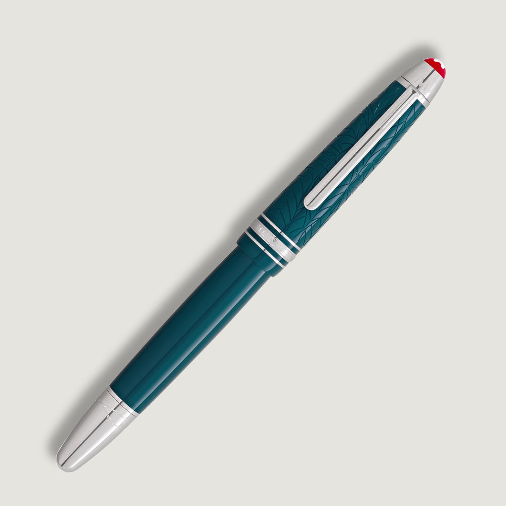 Luxury Montblanc Romeo & Juliet LeGrand rollerball pen featuring engraved rose and leaf pattern detailing.