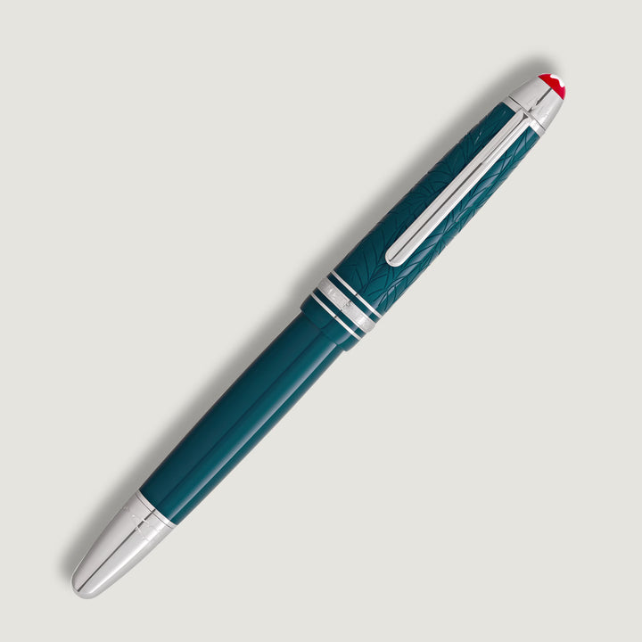 Luxury Montblanc Romeo & Juliet LeGrand rollerball pen featuring engraved rose and leaf pattern detailing.