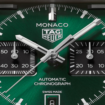 TAG Heuer Monaco CDW2180.FC8360 green dial watch with black chronograph counters
