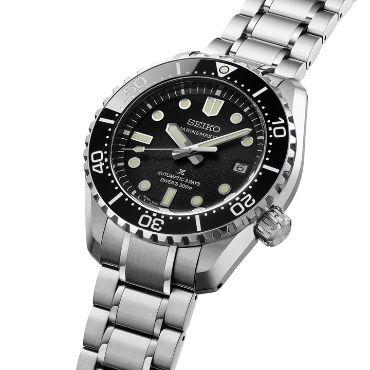 Seiko Marinemaster 1968 Heritage Diver featuring a black ceramic bezel and steel bracelet