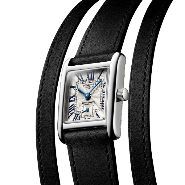 close up of the DolceVita dial and black multi strap wrist strap.