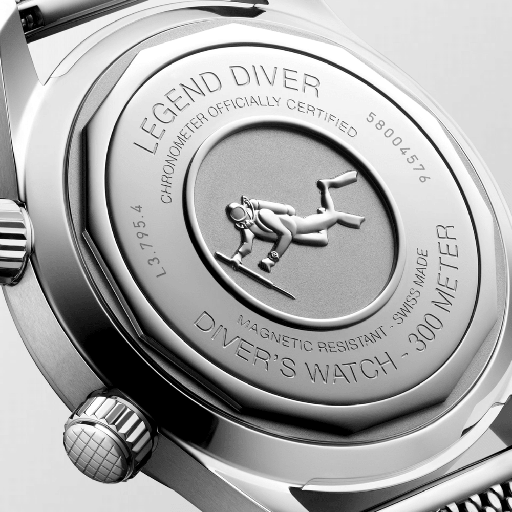 Caseback of the Longines Legend Diver stainless steel watch, showcasing the engraved Longines branding, heritage emblem, and automatic movement design.