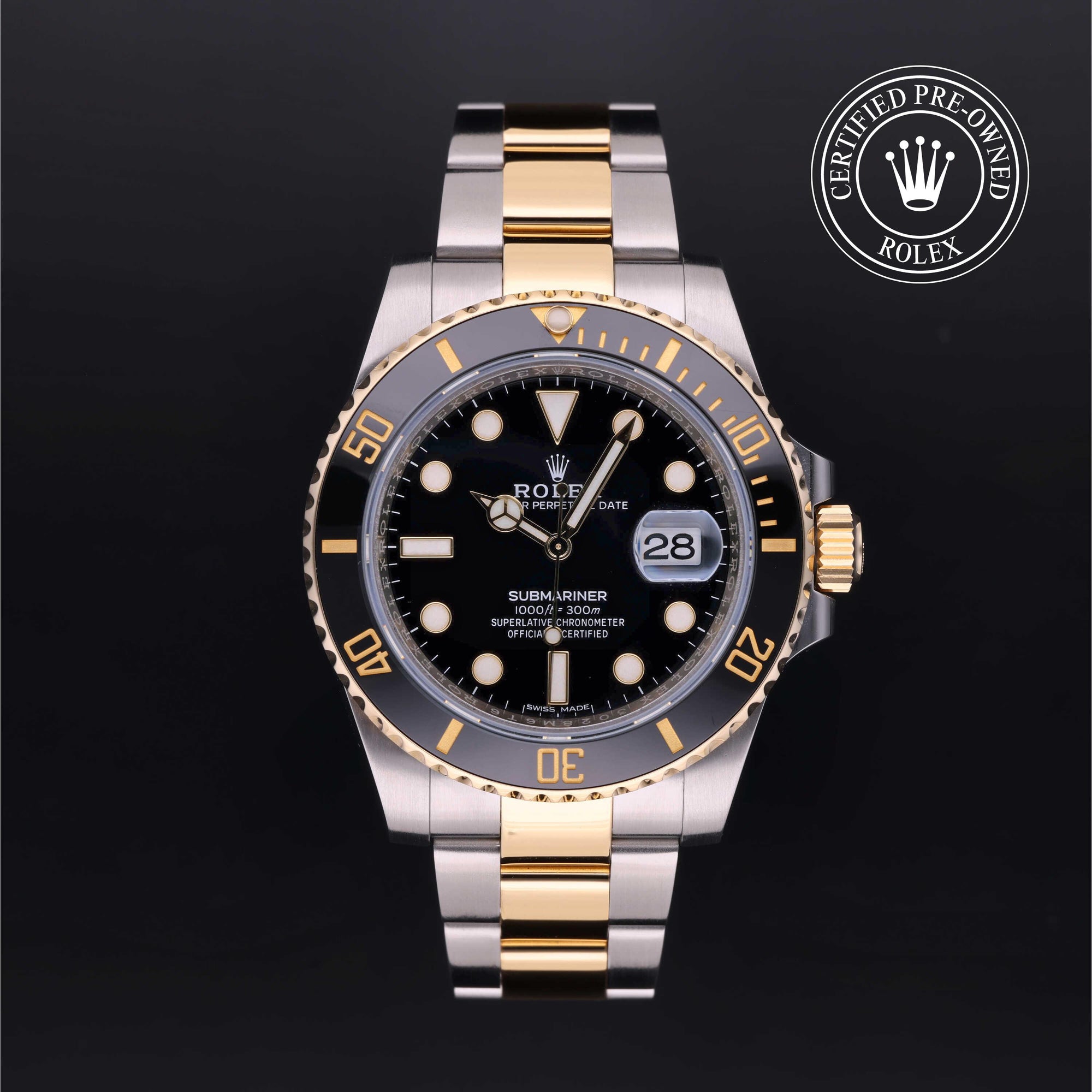 Rolex Certified Pre-Owned Submariner Date M16613 with black dial, black Cerachrom-style bezel, Oystersteel and yellow gold Oyster bracelet.