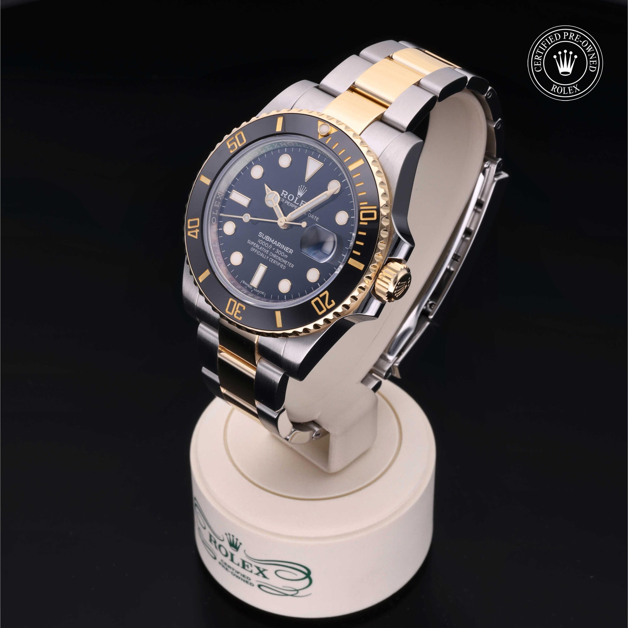 Side profile of the Rolex Certified Pre-Owned Rolex Submariner Date M16613 showing the Oystersteel and yellow gold case and Oyster bracelet.