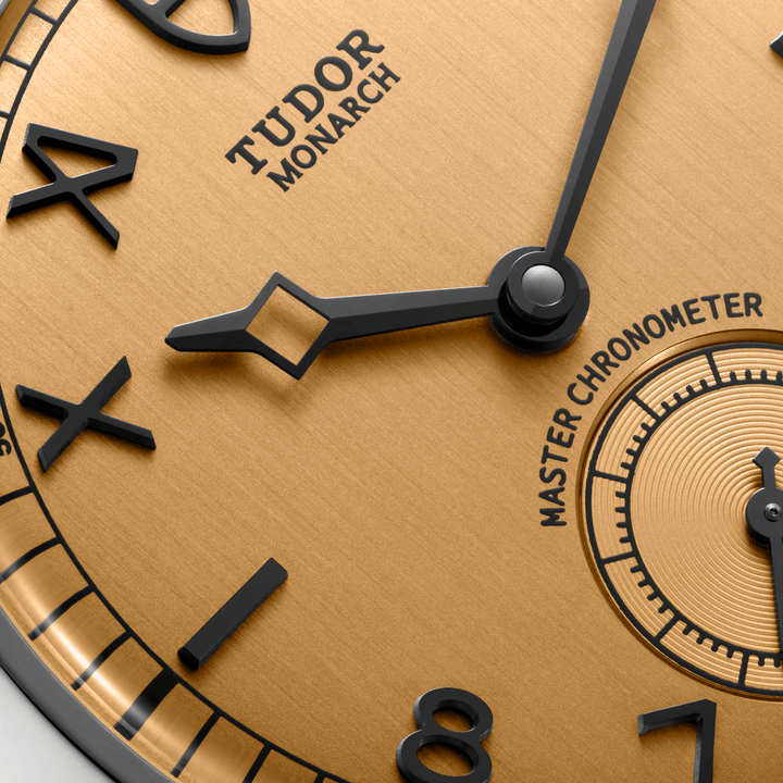 TUDOR Monarch heritage-inspired dress watch with dark champagne dial