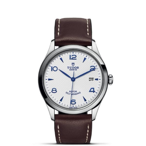 TUDOR 1926 39mm watch with an opaline dial, blue hands and brown leather strap