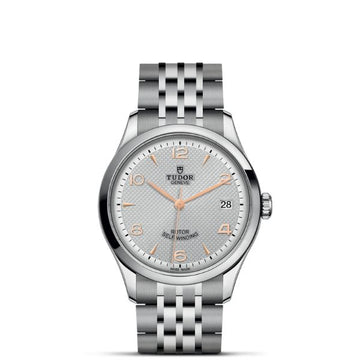 TUDOR 1926 36mm silver dial watch with gold-coloured details and a seven-row steel bracelet