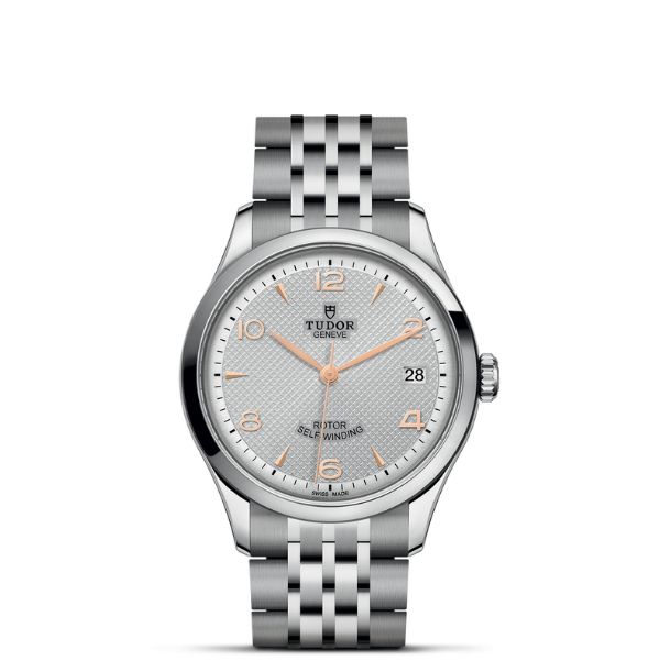 TUDOR 1926 36mm silver dial watch with gold-coloured details and a seven-row steel bracelet