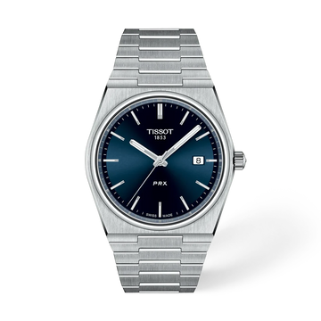 Tissot PRX 40mm quartz watch with blue dial and integrated stainless steel bracelet
