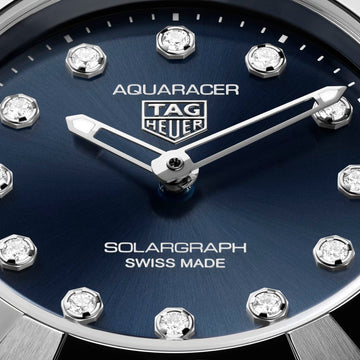 TAG Heuer WBP141E.BA0049 featuring diamond hour markers and solar-powered movement