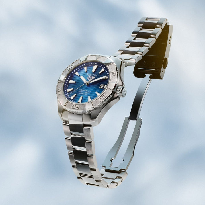TAG Heuer Aquaracer Professional 200 Solargraph featuring blue sunray dial, date display and steel bracelet