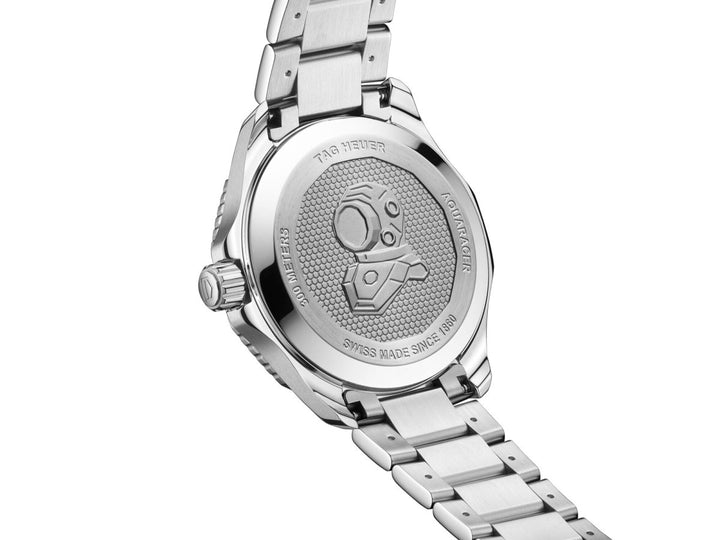 TAG Heuer Aquaracer Professional 300 GMT stainless steel caseback showing engraved diver helmet and Swiss automatic movement