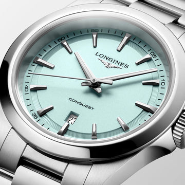 Longines Conquest 30mm ladies watch featuring a mint blue dial and stainless steel case