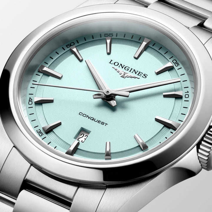 Longines Conquest 30mm ladies watch featuring a mint blue dial and stainless steel case
