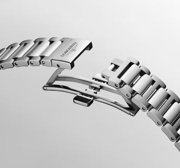 Longines Conquest 38mm gilt dial watch with stainless steel bracelet