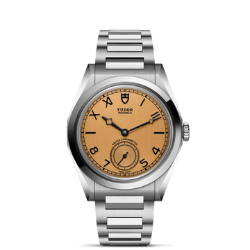 TUDOR Monarch M2639W1A0U-0001 with dark champagne papyrus-inspired dial and stainless steel bracelet.